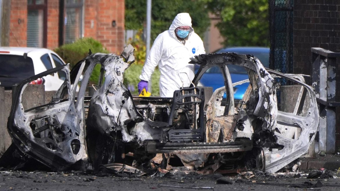 Babies among residents rushed to safety as device in car exploded next to police station