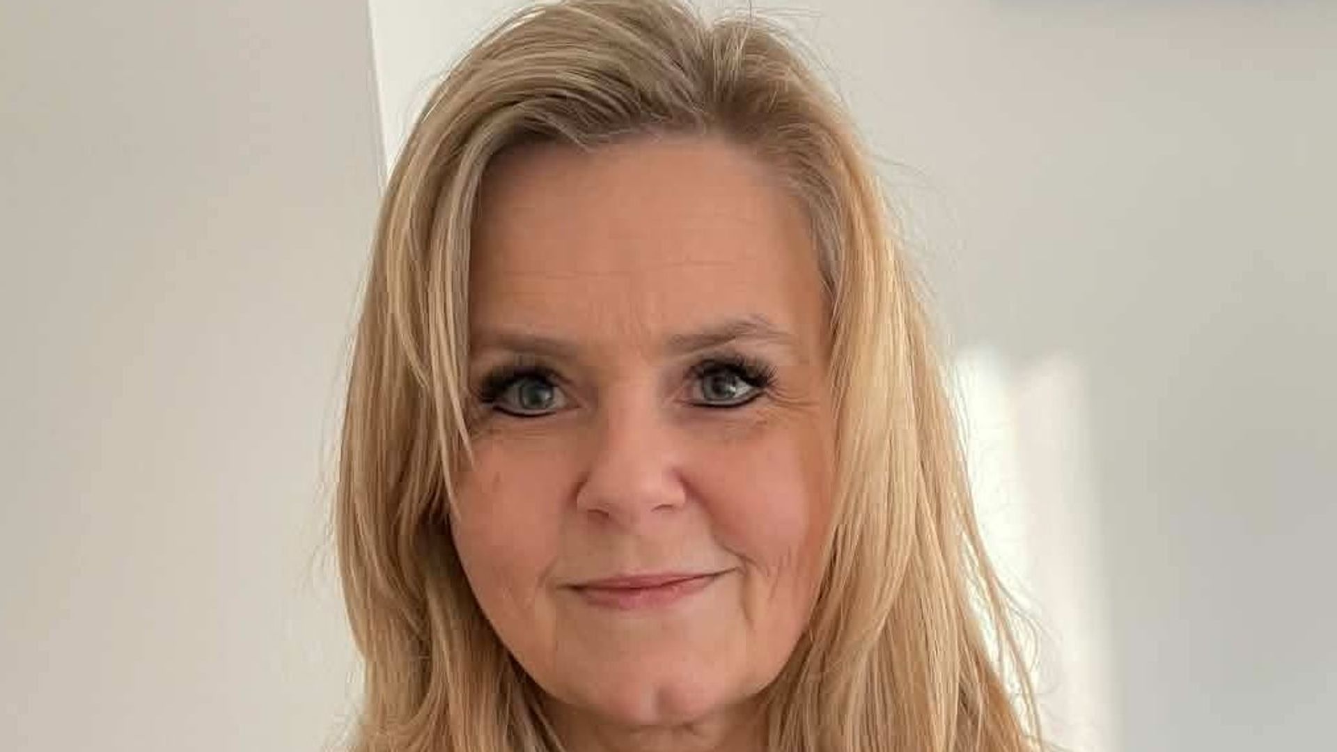 Man charged with murder after death of 'beloved mother'