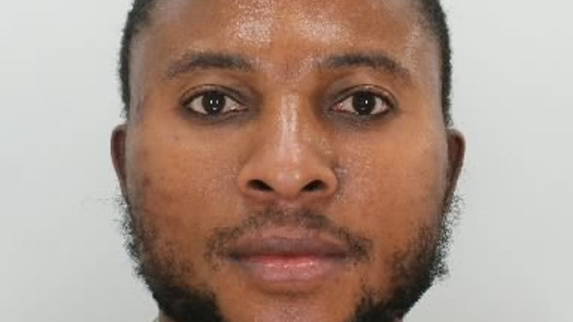 Woman arrested on suspicion of helping wanted dad who was convicted over baby's death