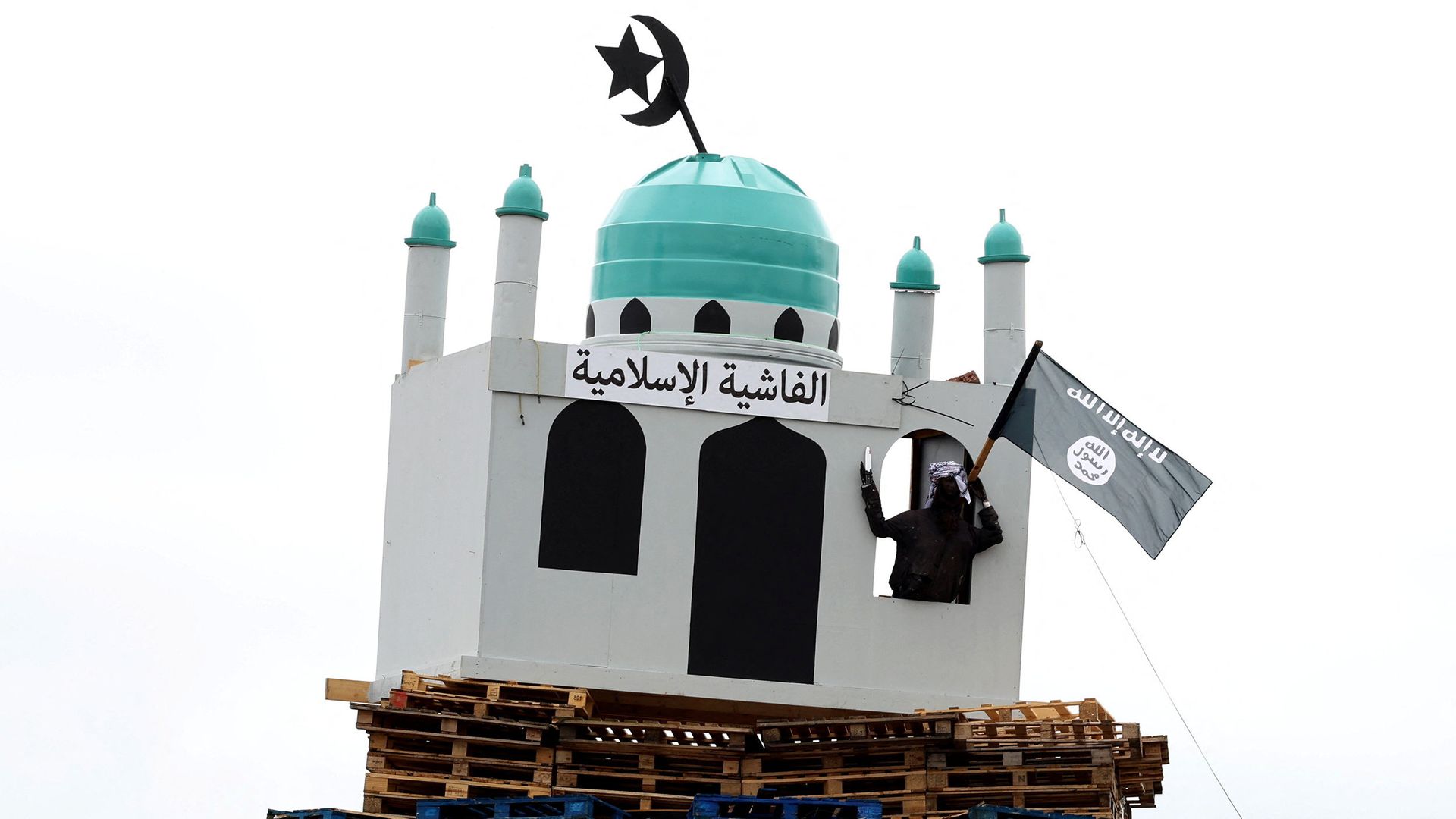 Mosque replica on bonfire condemned as act of 'vile' racial hatred