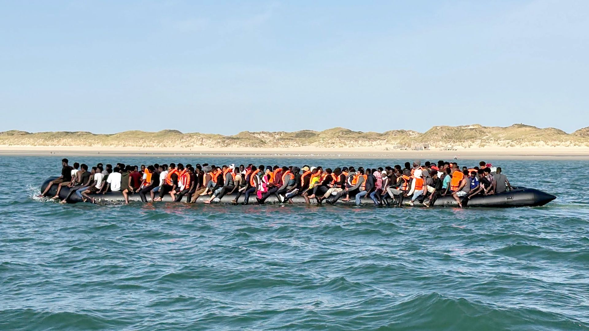 Record number of people arrive on one small boat – but what's behind fall in Channel crossings this year?