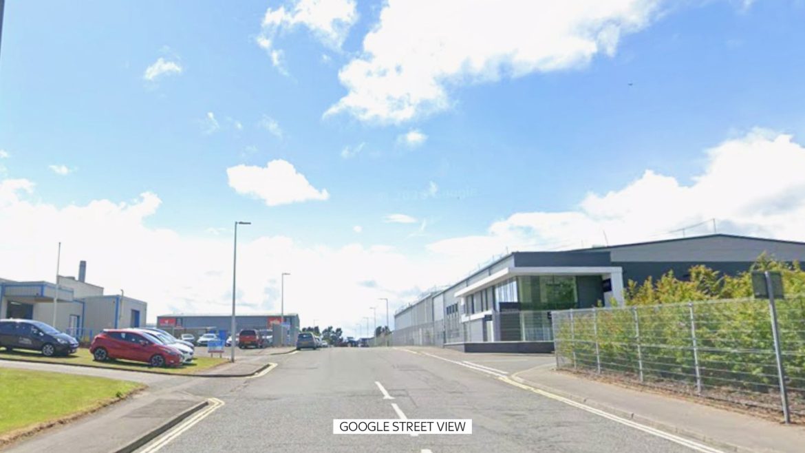 Girl, 9, dies after being found seriously injured at industrial estate – as man arrested