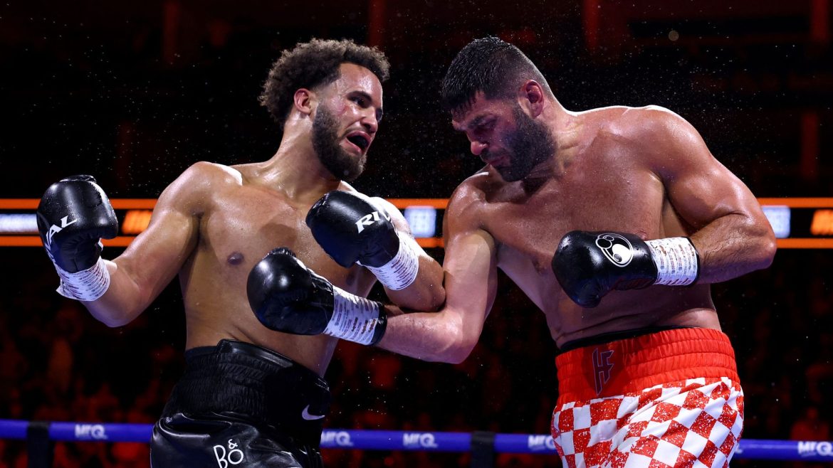 British boxer Moses Itauma stretchered off after shock defeat in world title fight